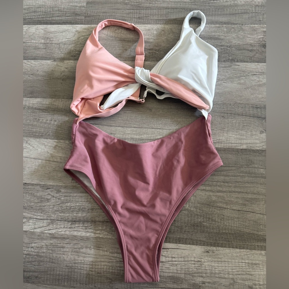 New without tags pink liky one piece swimsuit size small